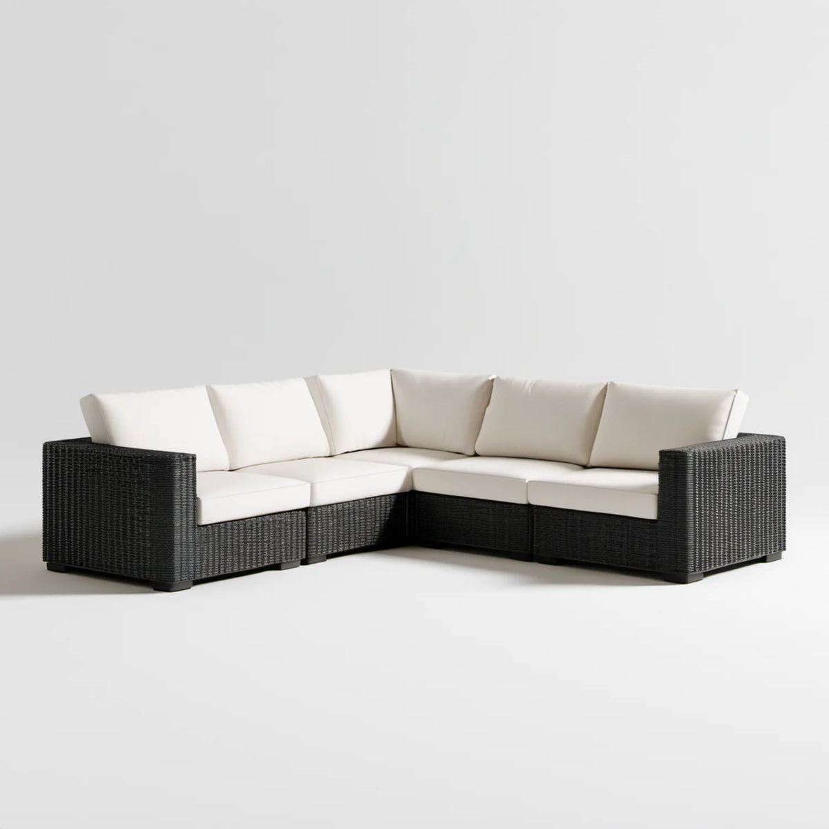Modułowa narożna sofa ogrodowa z technorattanu czarna z kremowymi poduszkami 280 x 210 x 65 cm